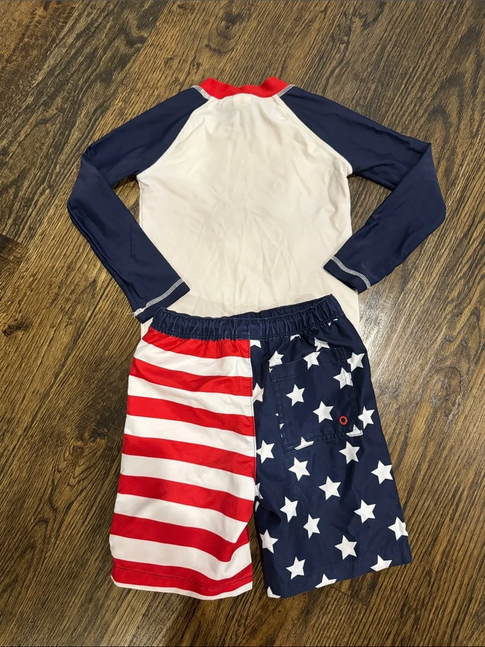 Patriotic shark swim trunks and rash guard